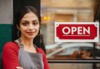 Woman standing business door