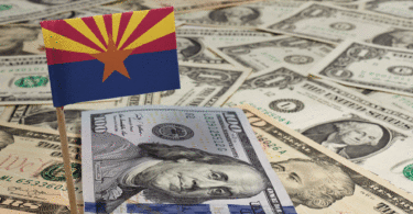 Arizona flag standing on cash