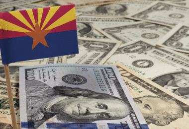 Arizona flag standing on cash